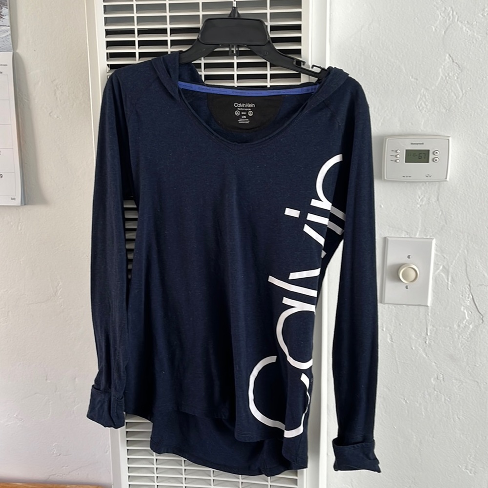 Calvin Klein long sleeve navy blue sportswear top. Size large- t shirt material.